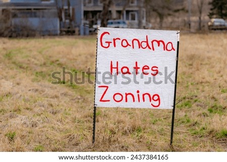 Grandma hates zoning sign in lawn, property, land, planning development