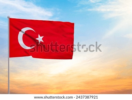 3D illustration of a Turkey flag extended on a flagpole and in the background a beautiful sky with a sunset