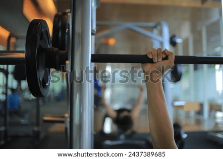 Man's hand during deadlift. Athlete bodybuilder lifting weights on a gym. concept sports lifestyle