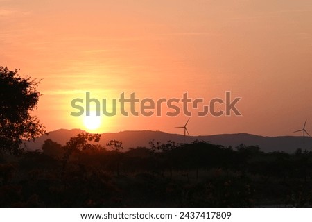 Landscape picture of Windmill during sunset time 