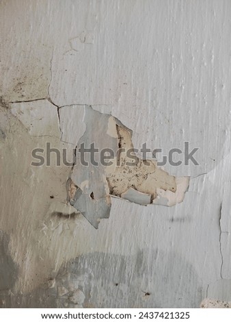 damaged buildings and peeling paint