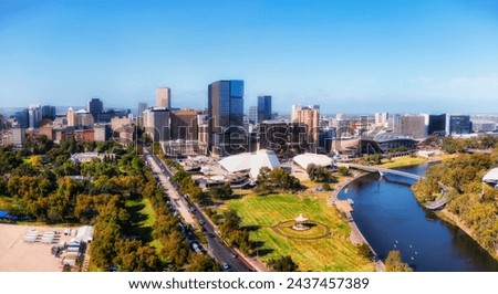 Skyline of Adelaide city CBD cityscape on shores of Torrens river in South Australia - aerial urban view. Royalty-Free Stock Photo #2437457389