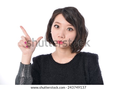 Smiling young woman showing isolated presentation against 
