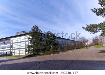 Diminishing perspective of buildings of Federal Institute of Technology ETHZ at Swiss City of Zürich on a sunny winter morning. Photo taken March 9th, 2024, Zurich, Switzerland. Royalty-Free Stock Photo #2437501147
