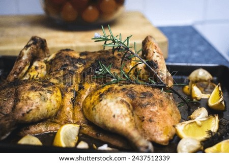 Spicy Delicious Broast Chicken with Lemon Piece Dinner For Ramadan Royalty-Free Stock Photo #2437512339