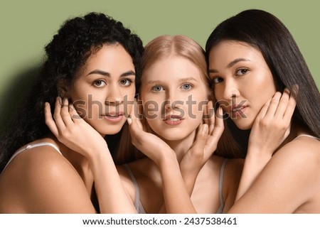 Beautiful young women on green background, closeup Royalty-Free Stock Photo #2437538461
