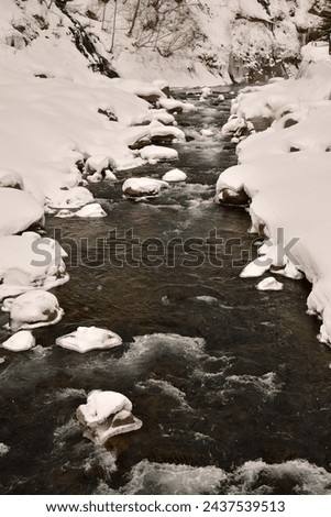 Cold river with snow water hokkaido Japan. High quality photo
