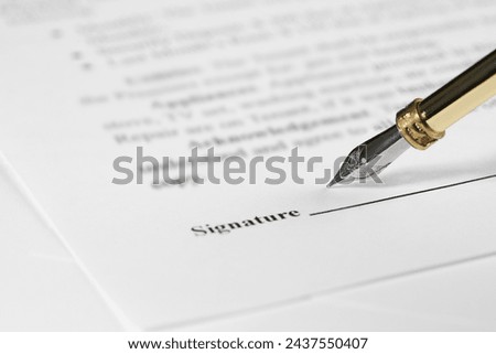 Signing notary document with fountain pen, closeup. Space for text Royalty-Free Stock Photo #2437550407