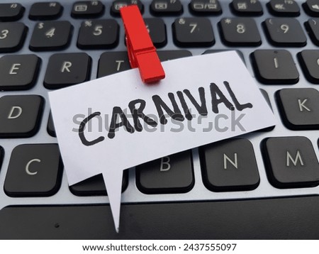 Carnival writting on laptop keyboard background.