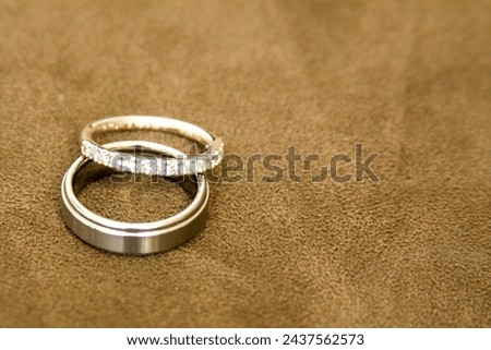 Duo of wedding bands on felt with copy space