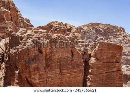 Jordan. Ancient city of Petra, rock-hewn is capital Nabataean kingdom. Houses, crypts and temples are carved into blocks of red sandstone. Pink city of Petra is one of seven new wonders of world. Royalty-Free Stock Photo #2437565621