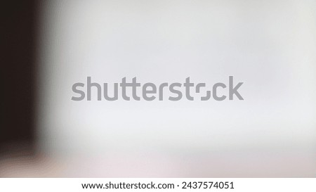 abstract blur modern interior inside entrance building of office in blue background with orange light effect concept