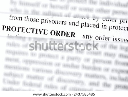 close up photo of the words protective order Royalty-Free Stock Photo #2437585485