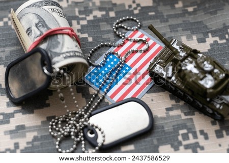 Military ID tags with USA flag on uniform background