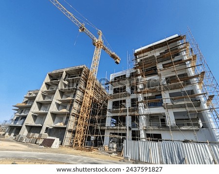Under construction residential building with Concreate Block or bricks structure. Exterior view of highrise under construction building with modern design, under construction skyscraper or building 