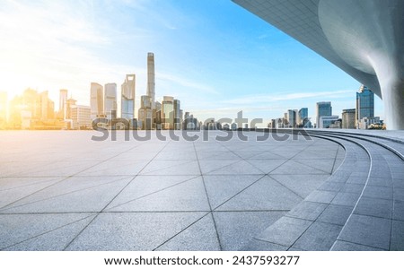 Empty square floor and city skyline with modern buildings in Shanghai