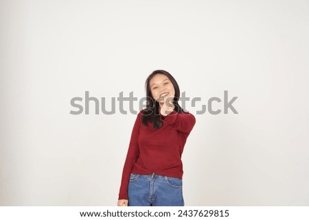 Young Asian woman in Red t-shirt Showing korean love finger isolated on white background