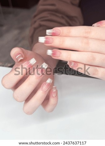 Woman with pink chrome nails design. Manicure. Nail salon. Classic bridal nail design. Nails trend