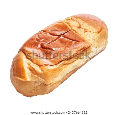 Isolated bread on white background depicts a fresh, brown, crusty loaf traditionally associated with simple sustenance. Royalty-Free Stock Photo #2437664311