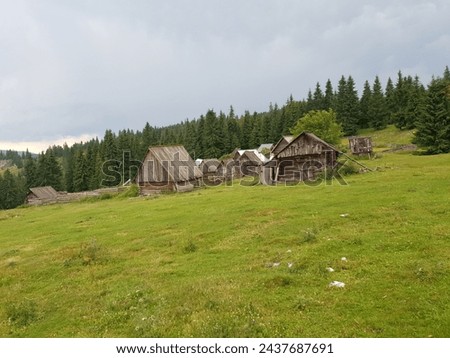 Small cabins cottages abandoned in the mountain area during rainy weather