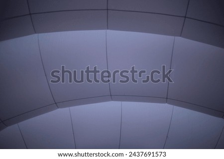 Inflatable structure in the city. Tunnel inside an air structure. Lightweight fabric filled with air.