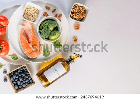 Fresh whole unprocessed food, anti-inflammatory diet products, healthy nutrition composition, top view Royalty-Free Stock Photo #2437694019