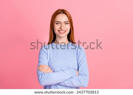 Portrait of good mood toothy beaming girl with foxy hairdo wear blue pullover holding hands crossed isolated on pink color background Royalty-Free Stock Photo #2437702813