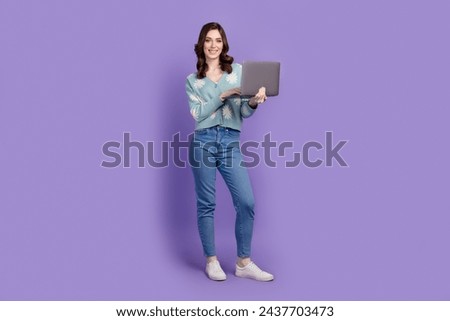 Full length photo of sweet cute woman wear flower print cardigan working modern gadget isolated purple color background