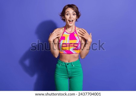 Photo of cheerful glad girl wear stylish clothes hand chest wow unexpected unbelievable victory isolated on purple color background Royalty-Free Stock Photo #2437704001