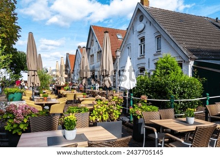 Cityscape of Greetsiel-Krummhoern, north sea, Germany Royalty-Free Stock Photo #2437705145