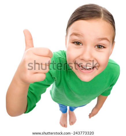 Little girl is showing thumb up gesture, fisheye portrait, isolated over white