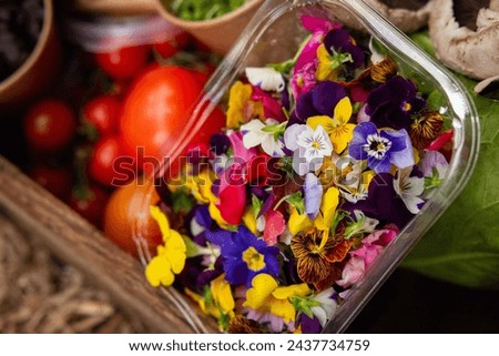 Colourful Freshly Picked Edible Flowers Royalty-Free Stock Photo #2437734759