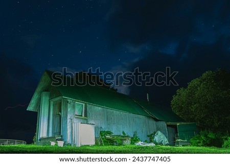 A solitary hut under a star-filled night sky, evoking a sense of peace and wonder