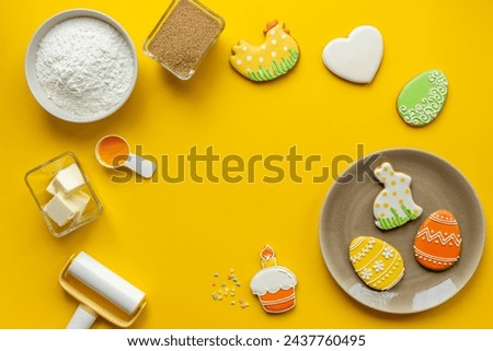 Baking holiday Easter cookies - eggs and bunny. Cooking background.
