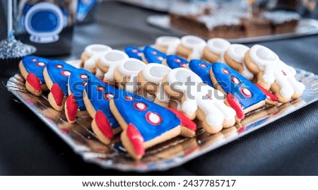 cookies shaped like astronauts and spaceship