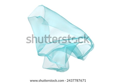 Beautiful light blue tulle fabric flying on white background