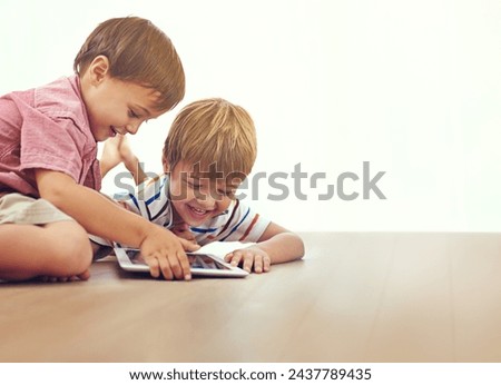 Family, children and siblings with tablet on a floor for cartoon, gaming or streaming movie at home. Digital, learning and boy kids in house for google it, search or Netflix and chill, app or bonding