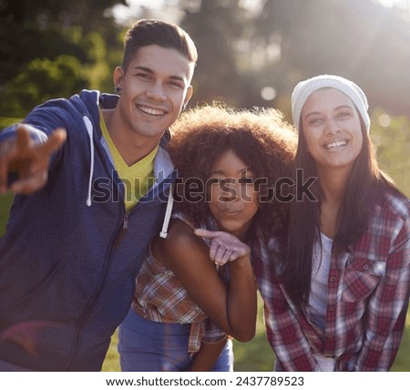 Portrait, smile and diversity student in nature, outdoors or garden with happy expression. Joy, fun and blowing kiss hand gestures from woman person, peace sign and university learner in park outside