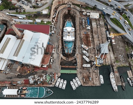 Aerial view of ship shipyard. View of ships during maintenance and repair. View of ships aerial shot