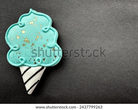 Ice cream blue cookie on a dark background
