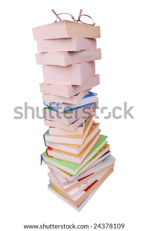 eye glasses on the stack of books isolated on white