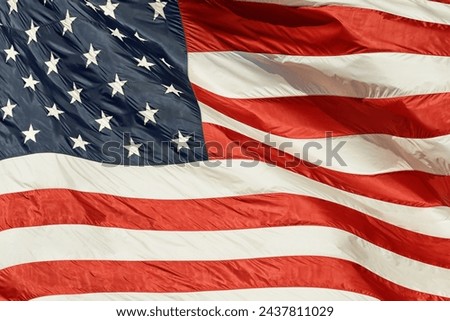 Star, stripes and American flag with symbol, graphic or illustration on banner, theme or abstract background. Waving icon of country heritage or glory for bravery, Independence Day or USA government Royalty-Free Stock Photo #2437811029