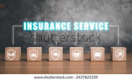 Insurance service concept, Wooden block on desk with insurance service icon on virtual screen.