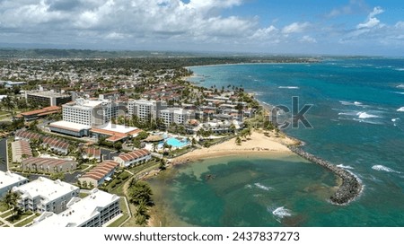 Aerial view of Dorado del Mar Beach Resort, in Dorado Beach, Puerto Rico.    A coastal community with a mix of residential and a coastal tourist resort.