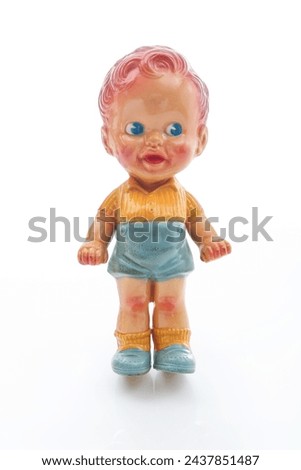 Vintage boy rubber doll squeaky toy  Royalty-Free Stock Photo #2437851487