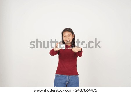 Young Asian woman in Red t-shirt Showing blank card isolated on white background