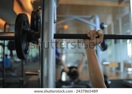 Man's hand during deadlift. Athlete bodybuilder lifting weights on a gym. concept sports lifestyle