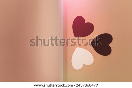 PAPER CUT HEART AND PLAIN BACKGROUNG