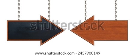 Blank wood arrow sign hanging on iron chains. Two black and brown sign with arrow isolated on white background