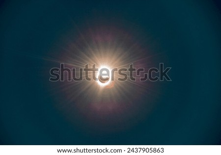 Total Solar Eclipse, sun covered by the moon in the sky. Royalty-Free Stock Photo #2437905863